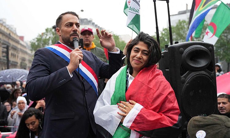 French MP says waving Palestinian flag was protest at 'massacre' French MP says waving Palestinian flag was protest at 'massacre' in Gaza