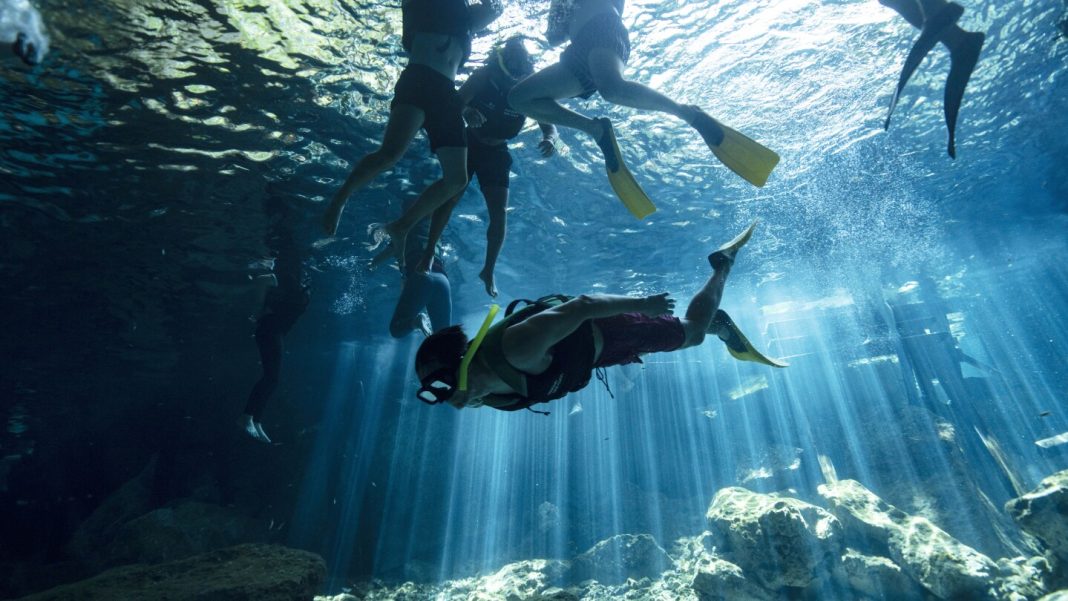 In Mexico’s Yucatan Peninsula, a hidden underground world is under threat by the Maya Train