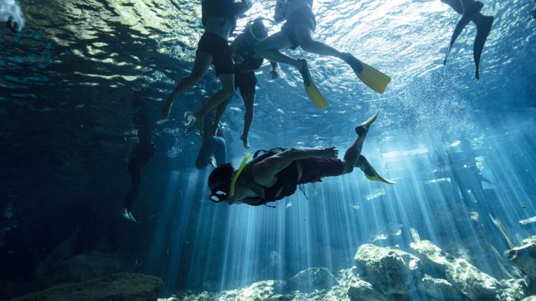 In Mexico’s Yucatan Peninsula, a hidden underground world is under threat by the Maya Train