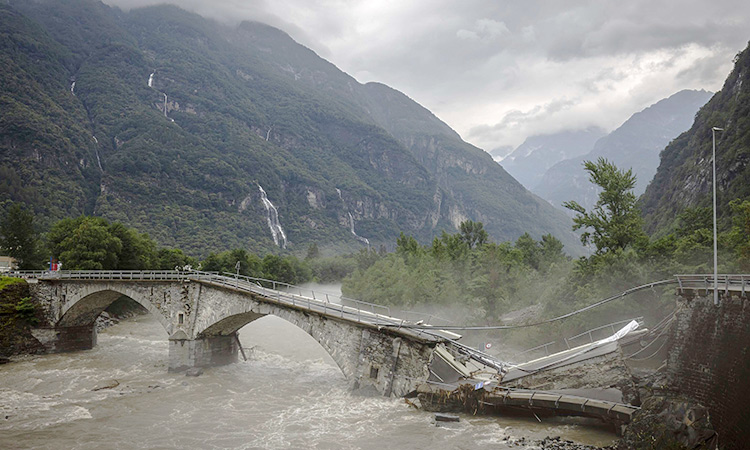 Four dead, two missing after landslides and floods in Switzerland Four dead, two missing after landslides and floods in Switzerland