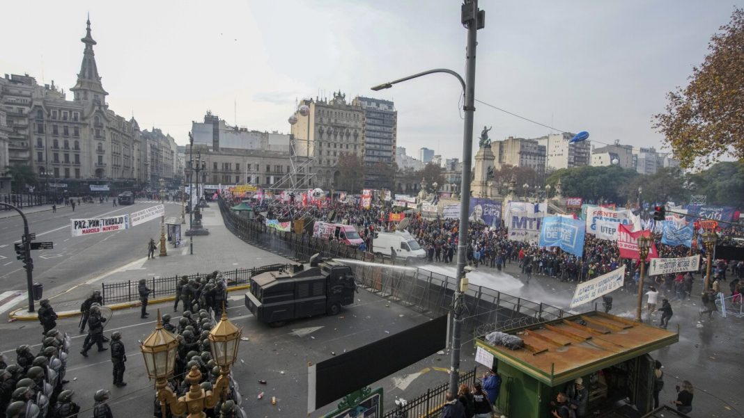 Argentine riot police disperse protesters with water cannons ahead of Argentine riot police disperse protesters with water cannons ahead of key Senate vote