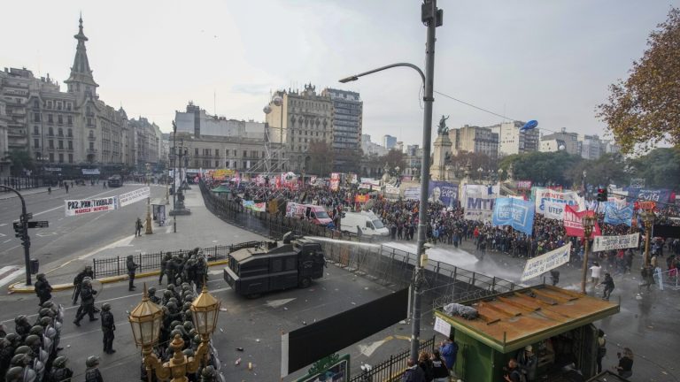 Argentine riot police disperse protesters with water cannons ahead of key Senate vote