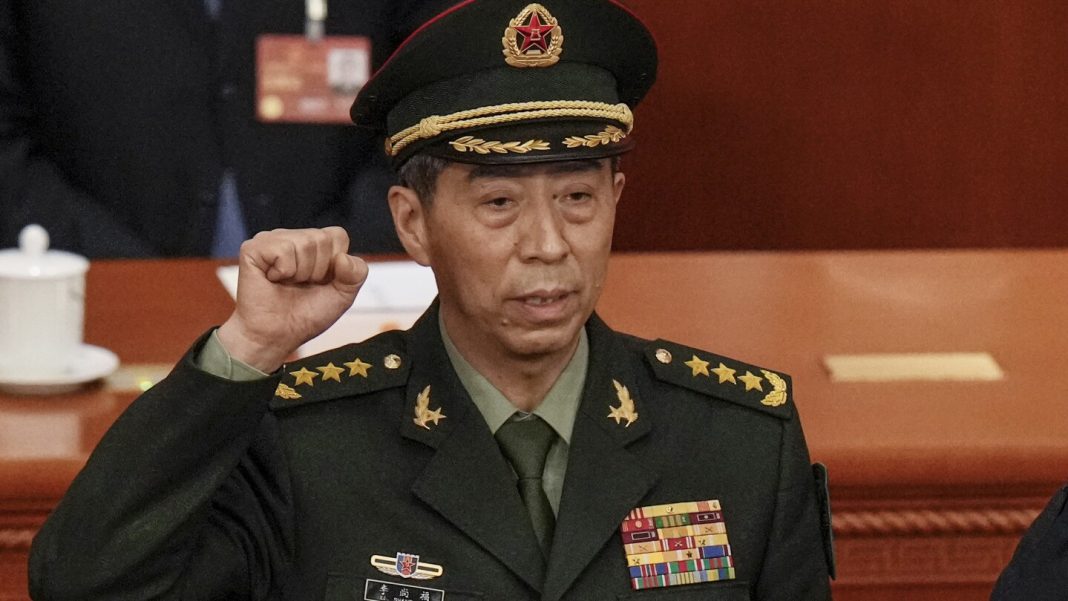 China expels 2 former defense ministers from its ruling Communist Party over graft allegations
