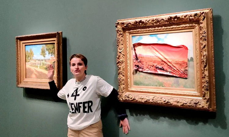 Climate activist arrested for defacing Monet painting in Paris Climate activist arrested for defacing Monet painting in Paris