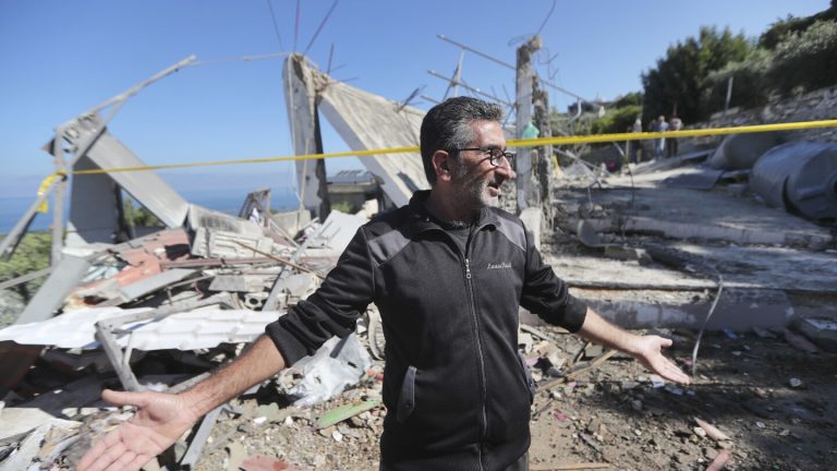 Hezbollah fighters shoot down an Israeli drone in Lebanon and fire rockets at an Israeli base