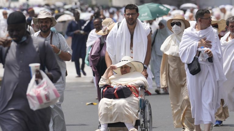 Masses of pilgrims in Saudi Arabia circle the Kaaba ahead of the official beginning of the Hajj