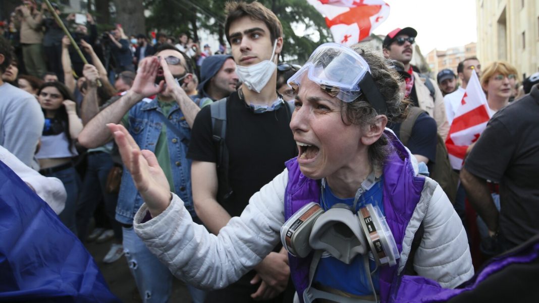 Parliament speaker in Georgia signs into law a bill that critics say curbs media freedom