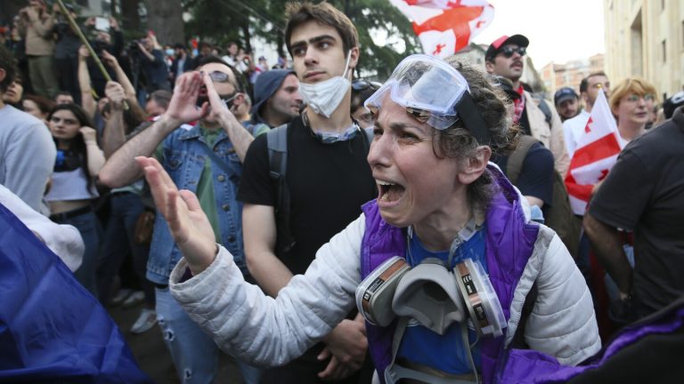 Parliament speaker in Georgia signs into law a bill that critics say curbs media freedom