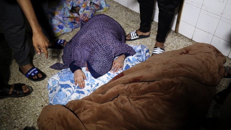 The Latest | Israeli strikes kill 11 overnight in Gaza, including a family of 3 at a refugee camp