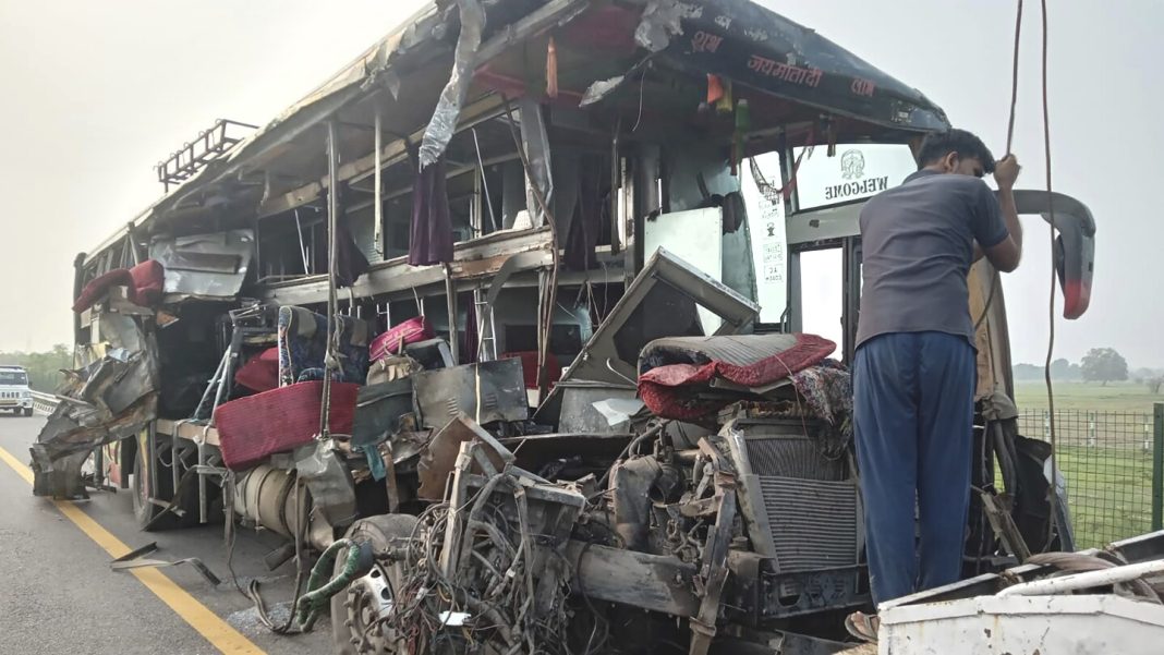 A double-decker bus collides with a milk truck in northern India, killing at least 18 people