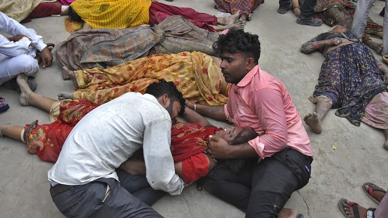 A stampede at a religious event in India has killed at least 105 people, many women and children