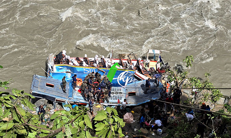 27 dead as bus carrying Indian tourists plunges into Nepal 27 dead as bus carrying Indian tourists plunges into Nepal river