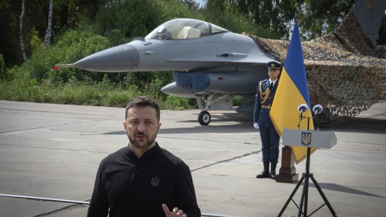 Ukraine’s Zelenskyy displays newly arrived F-16 fighter jets to combat Russia in the air