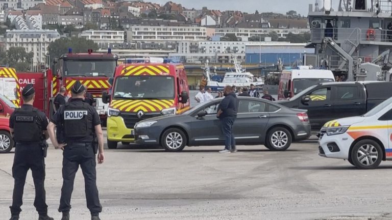 A boat with dozens of migrants rips apart in the English Channel off France, killing 12