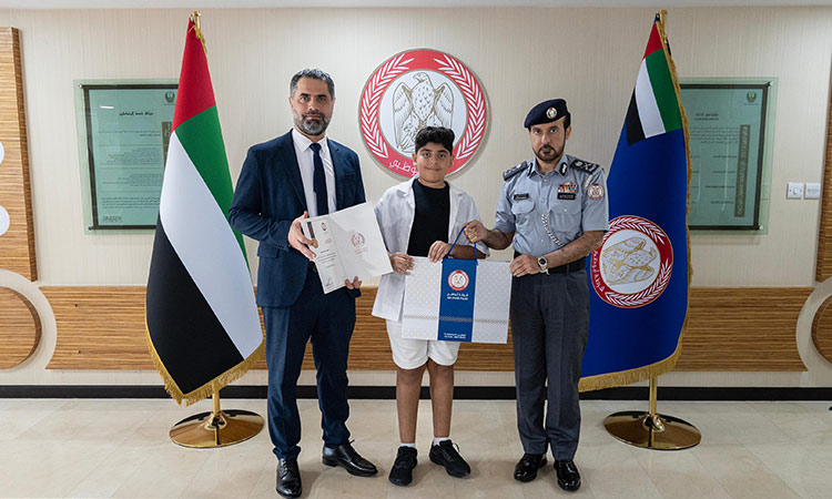 Abu Dhabi Police honour a child for his exemplary conduct Abu Dhabi Police honour a child for his exemplary conduct
