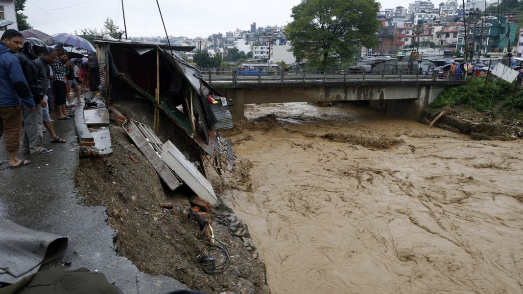 Death toll in Nepal flooding and landslides reaches at least Death toll in Nepal flooding and landslides reaches at least 100, with dozens still missing