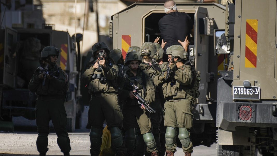 Israeli airstrikes hit UN school and homes in Gaza and kill at least 34 people, hospitals say