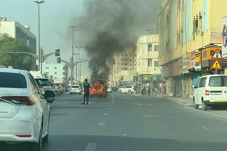 Sharjah Civil Defence team douses a car fire in 2 Sharjah Civil Defence team douses a car fire in 2 minutes