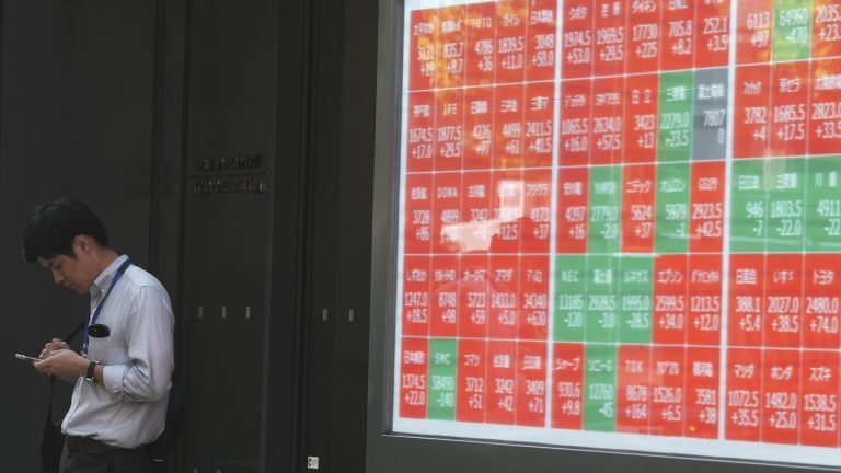 Stock market today: Asia shares mostly decline as investors await earnings, US elections