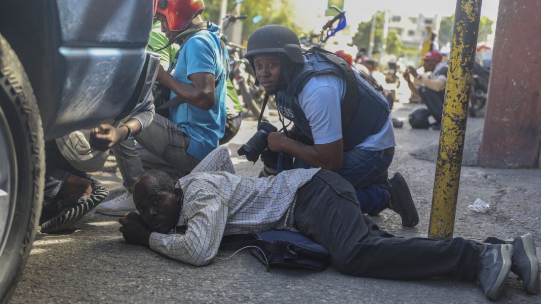 Haiti swears in a new prime minister as gangs open Haiti swears in a new prime minister as gangs open fire at a flight landing in the main airport