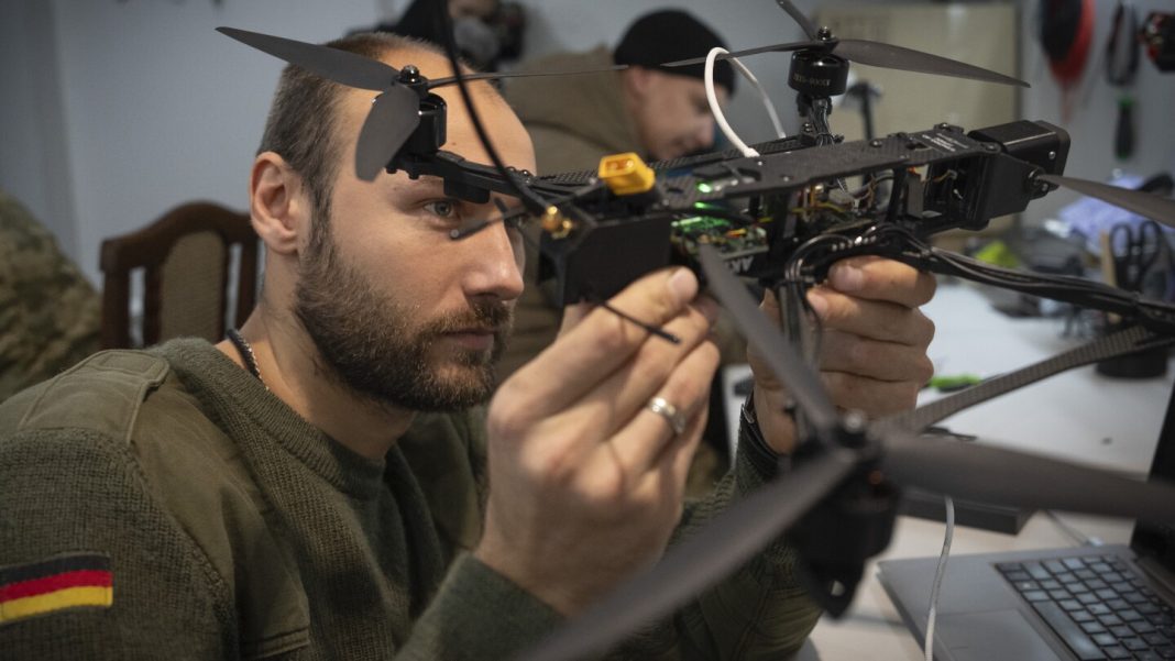 Ukrainian soldiers focus on keeping Russian advances at bay and Ukrainian soldiers focus on keeping Russian advances at bay and brace for storm to come from US